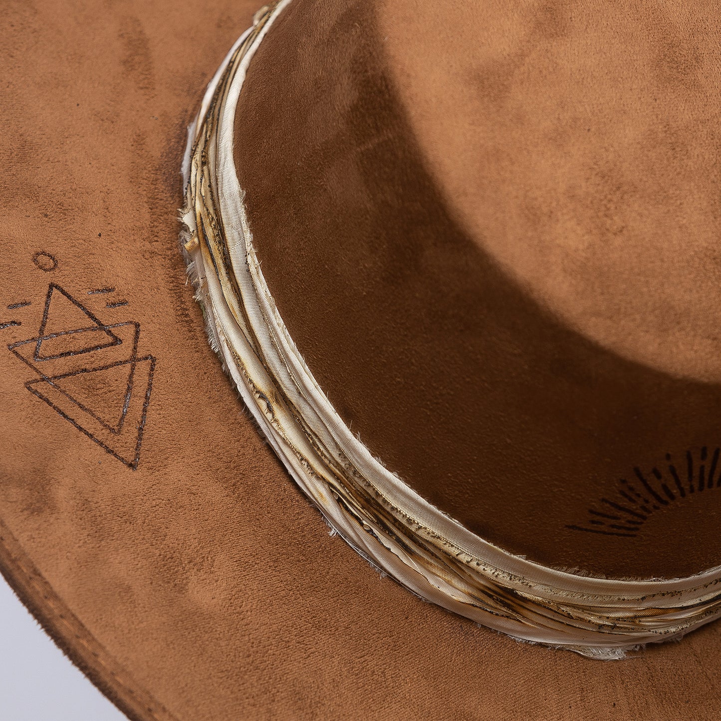 ''Taino Symbols'' Cordoban in taupe suede